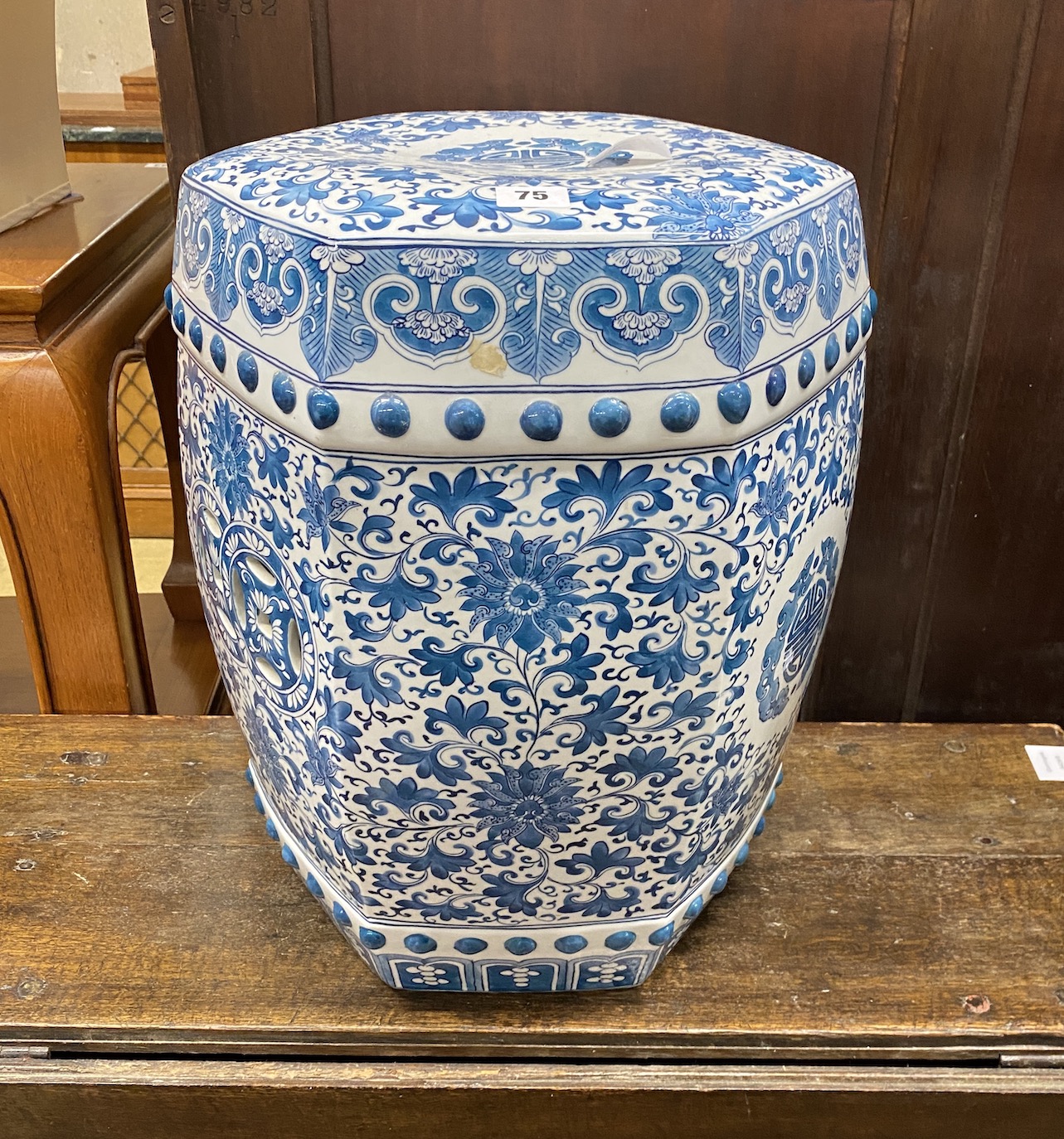 A Chinese hexagonal blue and white porcelain garden seat, height 46cm